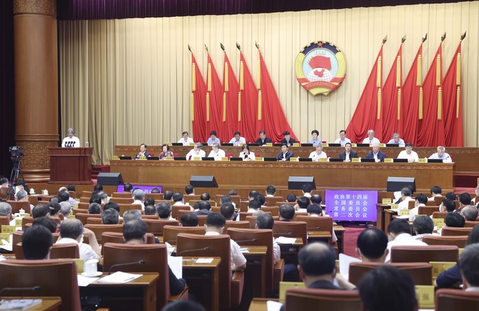 全國政協十四屆常委會第二次會議舉行全體會議 王滬寧出席